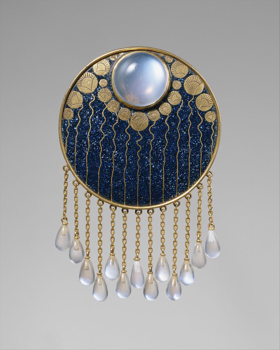 Real museum photograph of Ferdinand Hauser's gold, blue-enamel and moonstone brooch with thirteen drops suspended from fine chains
